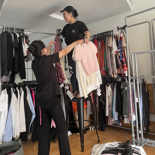 Passii team reviewing clothing