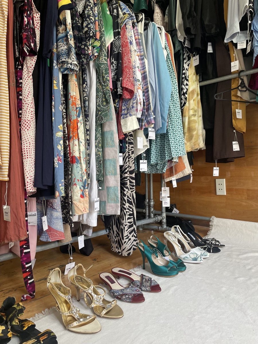 Passii reviewing and sorting resale items